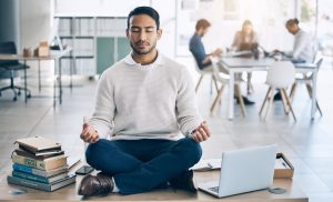 Meditation, relax or businessman with laptop, books or zen peace in office desk for work mindset, w